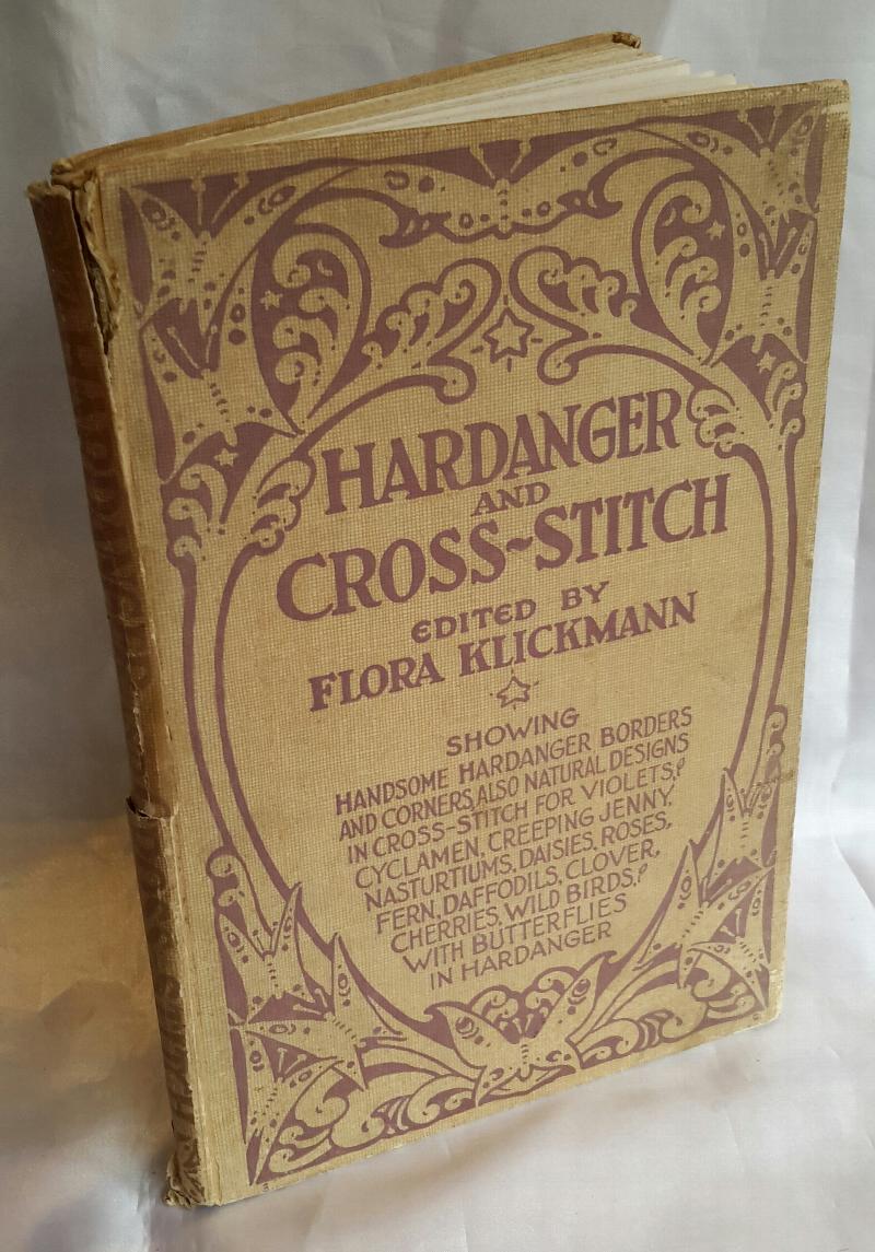 Image for Hardanger and Cross-Stitch. Showing Handsome Hardinger Borders and Corners, also Natural Designs in Cross-Stitch for Violets, Cyclamen, Creepig Jenny, Nasturtiums, Daisies, Roses, Fern, Daffodils, Clover, Cherries, Wild Birds, with Butterflies in Hardinger.